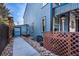 Charming home exterior with a walkway, rock garden, and stylish blue siding at 14707 E Wagon Trail Dr, Aurora, CO 80015