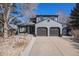 Lovely two-story home featuring a two-car garage and a low-maintenance front yard at 14707 E Wagon Trail Dr, Aurora, CO 80015