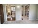 Open-concept living area with hardwood floors and natural light at 14707 E Wagon Trail Dr, Aurora, CO 80015