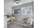 Comfortable home office space with a stylish desk, natural light, and neutral decor at 14707 E Wagon Trail Dr, Aurora, CO 80015