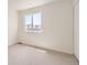 Cozy bedroom with neutral carpet and a window offering ample natural light at 1138 W 84Th Pl, Denver, CO 80260