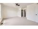 Expansive primary bedroom with neutral carpet and ensuite bathroom at 1138 W 84Th Pl, Denver, CO 80260