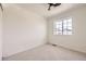 Comfortable bedroom featuring a window with a view of the neighborhood at 1138 W 84Th Pl, Denver, CO 80260