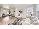 Cozy living room with modern decor and ample natural light at 1138 W 84Th Pl, Denver, CO 80260