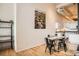 Dining area with hardwood floors and modern furniture at 1555 California St # 304, Denver, CO 80202
