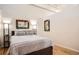 Relaxing main bedroom with stylish decor and modern lighting at 1555 California St # 304, Denver, CO 80202