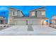 Modern two-story home featuring a gray exterior, two-car garage and contemporary design at 1734 Peak Prairie Ln, Monument, CO 80132