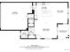 Detailed first-floor plan of a home, showcasing the kitchen, living room, garage, and dining area at 1734 Peak Prairie Ln, Monument, CO 80132