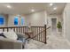 Upstairs hallway with carpet and natural light at 1734 Peak Prairie Ln, Monument, CO 80132