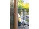 Cozy balcony with outdoor seating and a view of the surrounding greenery at 3069 Tejon St # B, Denver, CO 80211