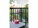 Enjoy ice cream with a beautiful city view from this cozy balcony setting, perfect for relaxing outdoors at 3069 Tejon St # B, Denver, CO 80211