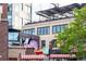 Exterior of mixed-use building with cow statue and awning in the LoDo neighborhood of Denver at 3069 Tejon St # B, Denver, CO 80211