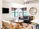 Modern living room features a stylish sofa, marble table, and contemporary decor at 3069 Tejon St # B, Denver, CO 80211
