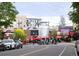 Street view showcasing the Little Personal Ice Cream shop, surrounded by trees, parked cars, and city buildings at 3069 Tejon St # B, Denver, CO 80211