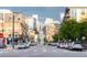 Street view showcasing a vibrant cityscape with modern buildings and parked vehicles in the LoDo neighborhood of Denver at 3069 Tejon St # B, Denver, CO 80211