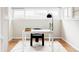 Bright office space featuring a modern desk, hardwood floors, and ample natural light at 2252 Harlan St, Edgewater, CO 80214