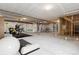 Unfinished basement featuring an unfinished ceiling, utility equipment, and a gym/exercise area at 5566 Hickory Oaks Trl, Castle Rock, CO 80104