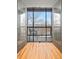 Charming balcony with lovely flooring and railing and a lovely view of trees at 84 Inca St, Denver, CO 80223