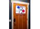 Stylish front door with unique stained glass detailing and modern hardware at 84 Inca St, Denver, CO 80223