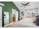 Comfortable bedroom with a view to the bathroom and closet space at 84 Inca St, Denver, CO 80223