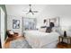 Serene bedroom with stylish decor, soft lighting, and a comfortable bed, creating a relaxing retreat at 84 Inca St, Denver, CO 80223