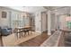 Inviting dining room featuring a modern light fixture and comfortable seating at 2538 Ambience Ln, Castle Rock, CO 80109