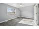 Bright bedroom with grey walls and carpeted floor at 639 Quartz Way, Broomfield, CO 80020