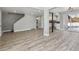 Large living room featuring wood floors and an open layout, ideal for modern living at 639 Quartz Way, Broomfield, CO 80020