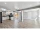 Spacious living room showcasing wood floors and an open concept design at 639 Quartz Way, Broomfield, CO 80020
