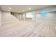 Finished basement with carpet, recessed lighting, and wet bar at 9451 E Evans Pl, Denver, CO 80231