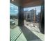 Balcony with metal railing features views of the street and surrounding buildings at 2330 Eliot St # 1, Denver, CO 80211