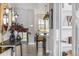 Inviting entryway with hardwood floors, modern decor, and natural light highlighting the open concept living space at 2190 S Poppy St, Lakewood, CO 80228