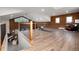 Open bonus room with vaulted ceilings, wood beams, and rustic charm at 57 Overlook Ct, Idaho Springs, CO 80452