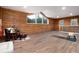 Large bonus room with log walls, views, and space for recreation at 57 Overlook Ct, Idaho Springs, CO 80452