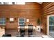 Cozy dining room with log walls and natural light at 57 Overlook Ct, Idaho Springs, CO 80452