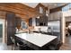 Contemporary kitchen with quartz countertops, stainless steel appliances, and wood accents offers a stylish cooking space at 57 Overlook Ct, Idaho Springs, CO 80452