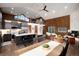 Open-concept living space features vaulted ceilings, wood beam accents, and natural light at 57 Overlook Ct, Idaho Springs, CO 80452