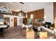 Spacious living room featuring a fireplace, wood accents, natural light, and an open floor plan for modern living at 57 Overlook Ct, Idaho Springs, CO 80452
