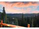 Mountainous landscape with a view of trees and hills during a colorful sunset at 57 Overlook Ct, Idaho Springs, CO 80452