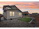 Landscaped backyard with gravel and a grassy area at 17693 Elati St, Broomfield, CO 80023