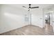 Spacious bedroom with wood-look floors and sliding closet doors at 17693 Elati St, Broomfield, CO 80023