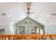 Vaulted open-concept loft space includes seating and an abundance of natural light at 26196 Rea Ave, Conifer, CO 80433
