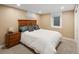 Comfortable bedroom with carpet, closet and window with white trim for natural light at 6402 E Cornell Ave, Denver, CO 80222
