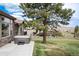 Exterior view of the house and hot tub, nestled amidst lush greenery and scenic landscapes at 16226 River Haven Way, Morrison, CO 80465