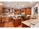 Traditional kitchen with stainless steel appliances, granite countertops and a center island at 16226 River Haven Way, Morrison, CO 80465