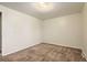 Bedroom featuring carpet at 7542 Otis St, Arvada, CO 80003