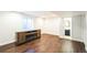 Finished basement area with modern fireplace and bathroom access at 2983 Fulton St, Denver, CO 80238