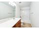 Bright bathroom with vanity, toilet, tub, and shower combination at 2983 Fulton St, Denver, CO 80238