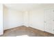 Spacious bedroom features neutral carpet, a ceiling light and two closet doors at 2983 Fulton St, Denver, CO 80238