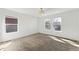 Bright bedroom with large windows providing lots of natural light and neutral carpet at 2983 Fulton St, Denver, CO 80238